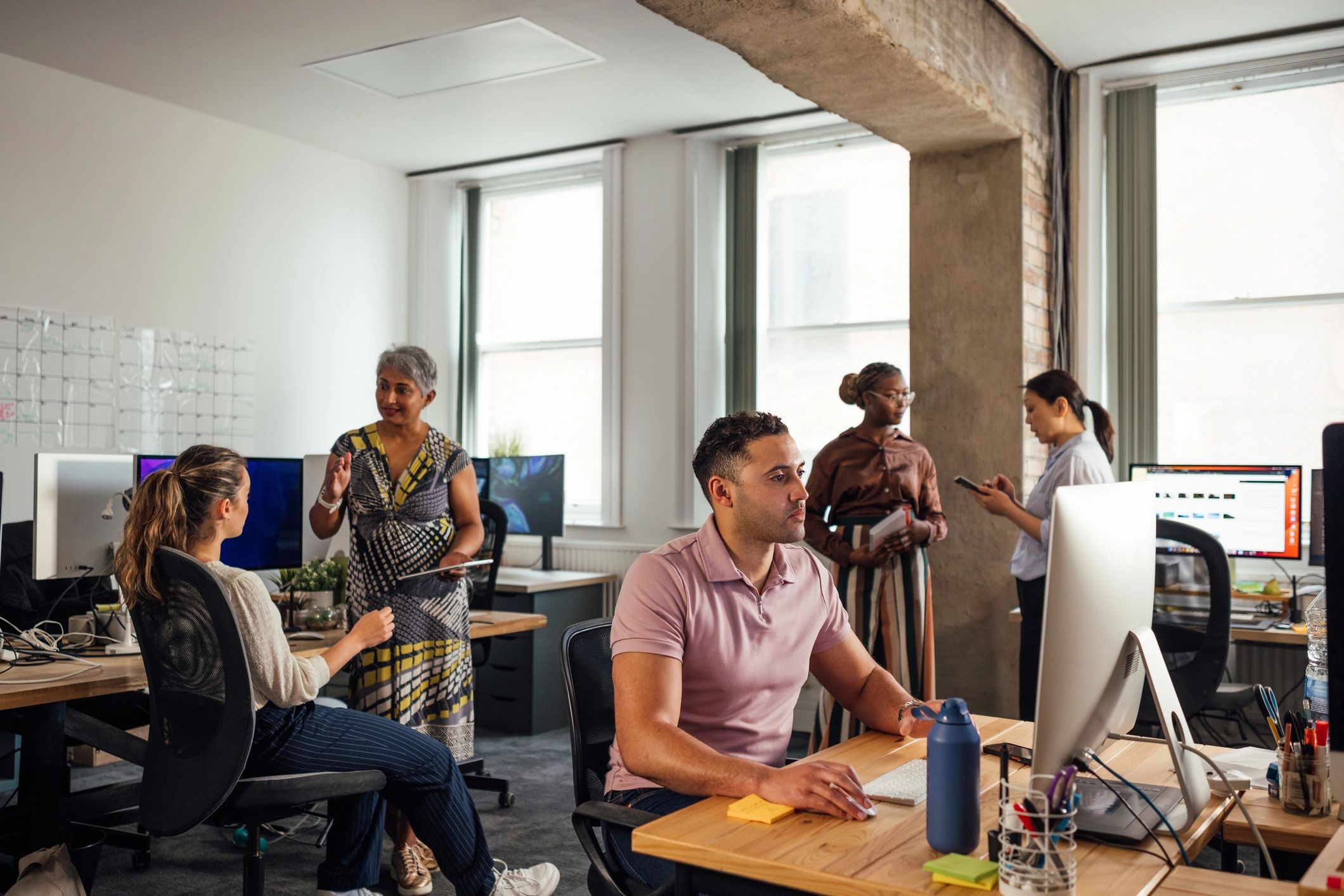 Business consulting team working together in an office